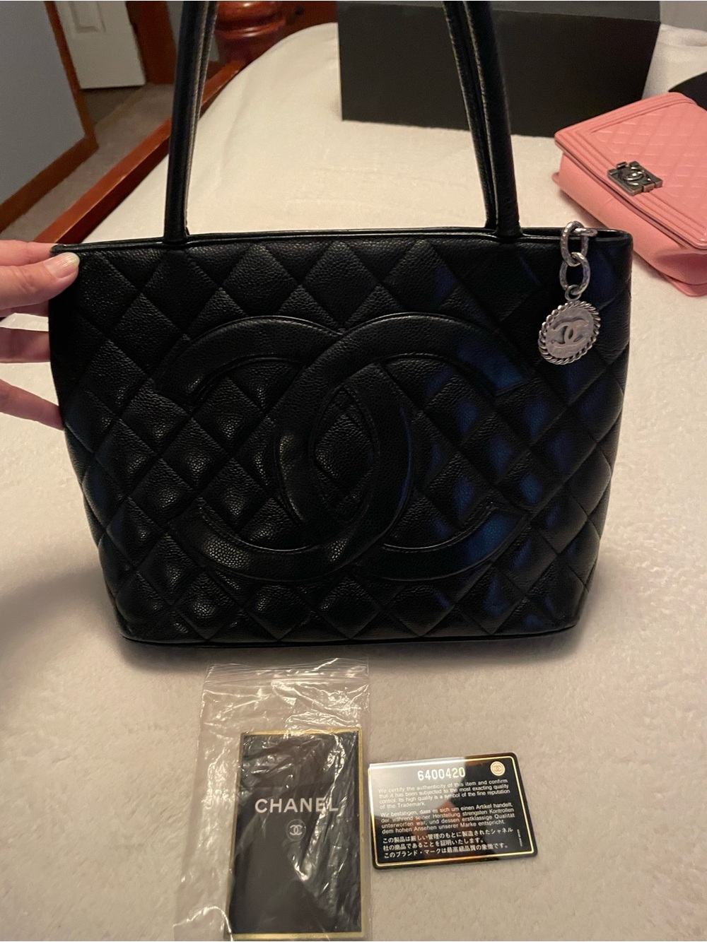 CHANEL Black Quilted Leather Tote with CC Medallion
